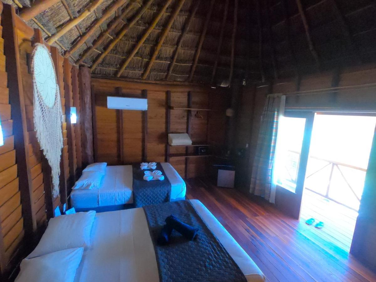 Palmeras de Mahahual Cabañas Bagian luar foto