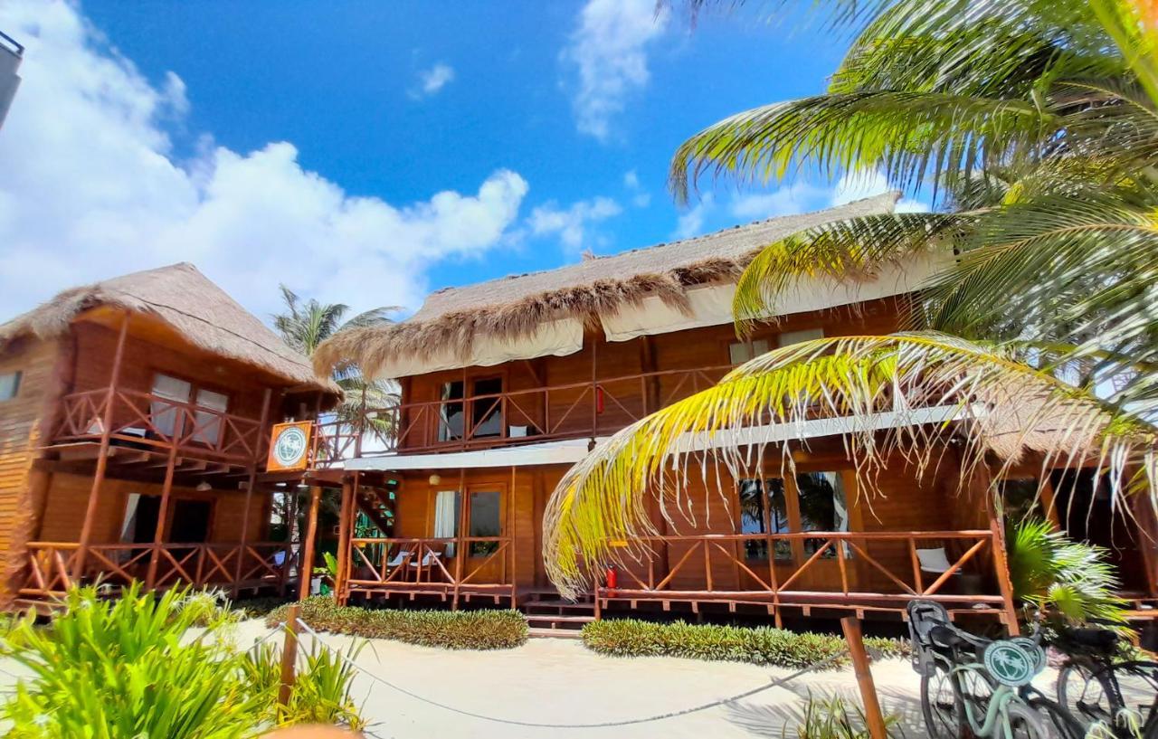 Palmeras de Mahahual Cabañas Bagian luar foto