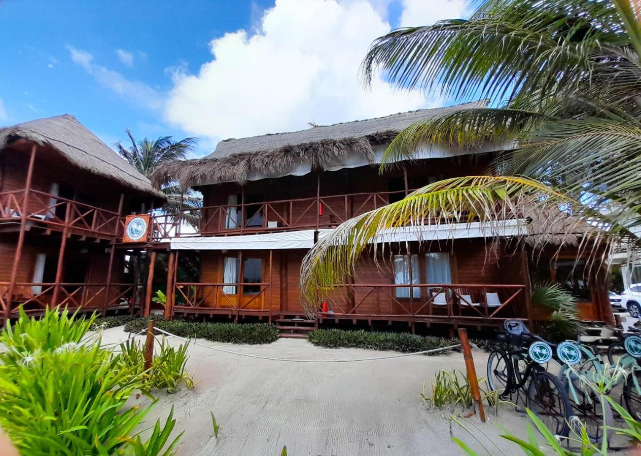 Palmeras de Mahahual Cabañas Bagian luar foto